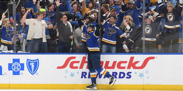 Jordan Kyrou (25) of St. Louis Blues celebrates after scoring a goal during the second period in game 4 of a first-round playoff series of the Stanley Cup NHL hockey against the Minnesota Wild on Sunday, May 8, 2022, in St. Louis. 