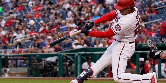 Washington Nationals' Juan Soto hits a two-run homer during the first inning of a baseball game against the New York Mets at Nationals Park, Wednesday, May 11, 2022, in Washington.