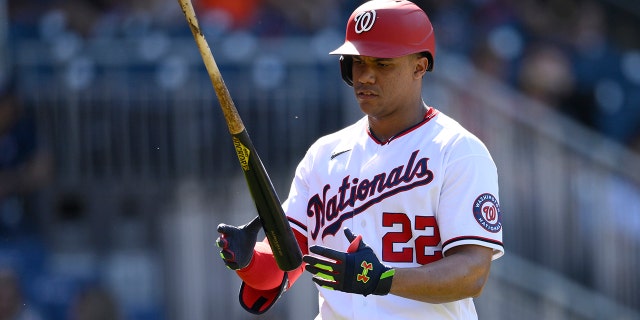 Washington Nationals' Juan Soto reacts after he struck out during the eighth inning of a baseball game against the Houston Astros, Sunday, May 15, 2022, in Washington.