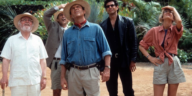 From left to right, Richard Attenborough, Martin Ferrero, Sam Neill, Jeff Goldblum and Laura Dern look up in a scene from the 1993 film "Jurassic Park."