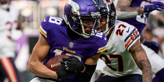 Justin Jefferson of the Vikings catches the ball against the Chicago Bears at U.S. Bank Stadium on Jan. 9, 2022, in Minneapolis, Minnesota.