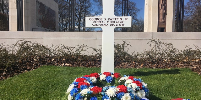 General George S. Patton's grave at the Luxembourg American Cemetery outside Luxembourg City stands on a singular plot facing rows and rows of the gravestones of American soldiers. 