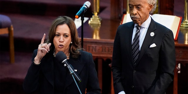 Vice President Kamala Harris speaks alongside the Rev. Al Sharpton during a memorial service for Ruth Whitfield, a victim of the Buffalo supermarket shooting, at Mt. Olive Baptist Church, Saturday, May 28, 2022, in Buffalo, N.Y. (AP Photo/Patrick Semansky)