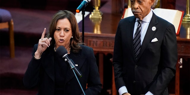 Vice President Kamala Harris speaks alongside the Rev. Al Sharpton during a memorial service for Ruth Whitfield, a victim of the Buffalo supermarket shooting, at Mt. Olive Baptist Church, May 28, 2022, in Buffalo, New York.