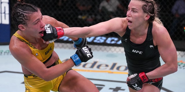 Katlyn Chookagian punches Amanda Ribas of Brazil in a flyweight fight at UFC APEX on May 14, 2022 a Las Vegas, Nevada.