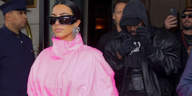 Kanye West and Kim Kardashian head out of their hotel on October 09, 2021 in New York City ahead of the reality TV star's "SNL" appearance.