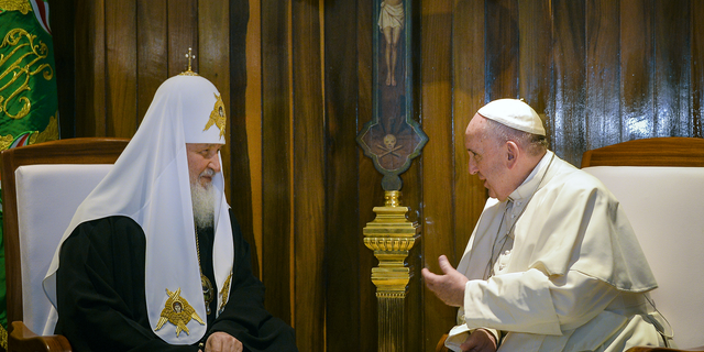 The head of the Russian Orthodox Church Patriarch Kirill, left, and Pope Francis talk during a meeting at the Jose Marti airport in Havana, Cuba, in February 2016.