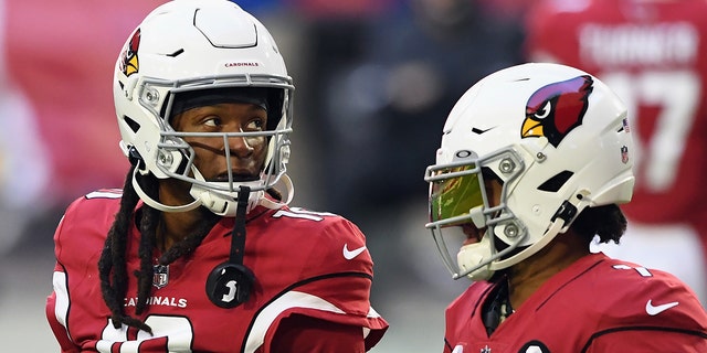 DeAndre Hopkins and Kyler Murray of the Cardinals prepare for the Philadelphia Eagles game at State Farm Stadium on Dec. 20, 2020, in Glendale, Arizona.