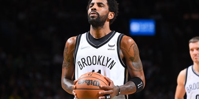 Kyrie Irving #11 of the Brooklyn Nets shoots a free throw against the Boston Celtics during Round 1 Game 1 of the 2022 NBA Playoffs on April 17, 2022 at the TD Garden in Boston, Massachusetts.