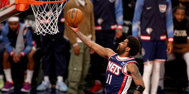 Kyrie Irving's absence from the Nets 'has been difficult for us to deal with,' says former assistant coach 3 Kyrie Irving of the Brooklyn Nets heads for the basket in game four of an Eastern Conference First Round playoff game against the Boston Celtics at Barclays Center on April 25, 2022 in Brooklyn.
