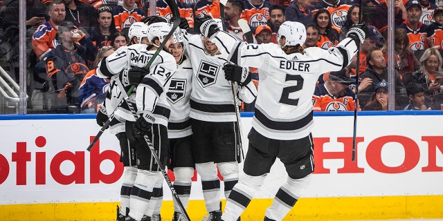 Los Angeles Kings celebrate a goal against the Edmonton Oilers during the first period of Game 1 of an NHL hockey Stanley Cup first-round playoff series, Monday, May 2, 2022 in Edmonton, Alberta.