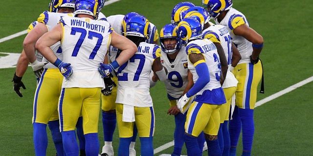 Matthew Stafford of the Los Angeles Rams huddles with his offense against the Cincinnati Bengals during Super Bowl LVI at SoFi Stadium on Feb. 13, 2022, in Inglewood, California.