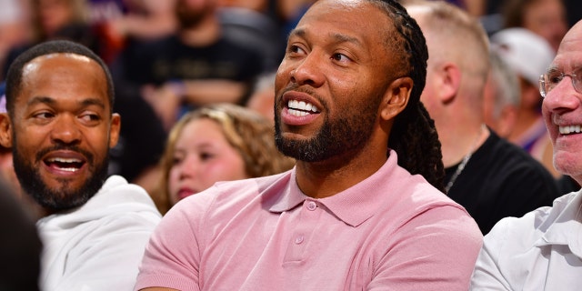 Larry Fitzgerald Jr. attends the playoff game between the Dallas Mavericks and the Phoenix Suns on May 15, 2022, at Footprint Center in Phoenix, Arizona.