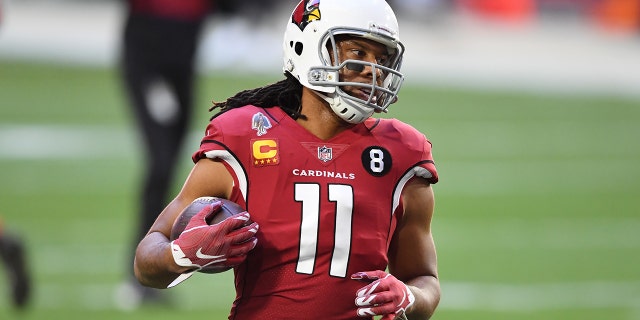 Wide receiver Larry Fitzgerald of the Cardinals runs a drill before the San Francisco 49ers game at State Farm Stadium on Dec. 26, 2020, in Glendale, Arizona.