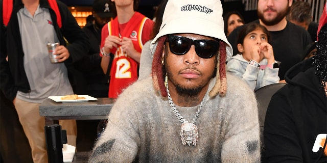 Rapper Lil Keed attends the game between the New Orleans Pelicans and the Atlanta Hawks at State Farm Arena on March 20, 2022, in Atlanta. 