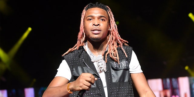 Rapper Lil Keed performs onstage during Hot 107.9 Birthday Bash 25 at Center Parc Credit Union Stadium at Georgia State University on July 17, 2021, in Atlanta.