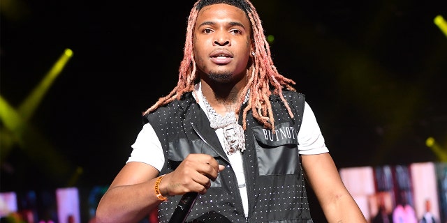 Rapper Lil Keed performs onstage during Hot 107.9 Birthday Bash 25 at Center Parc Credit Union Stadium at Georgia State University on July 17, 2021, in Atlanta.