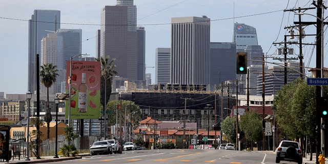 Downtown Los Angeles skyline in the background shown from the Broadway and Bishops Rd. where residents are opposed to the proposed Doger Stadium gondola that will run past their homes along Bishops Rd. in the Solono Canyon neighborhood on Thursday, March 17, 2022 in Los Angeles, CA.