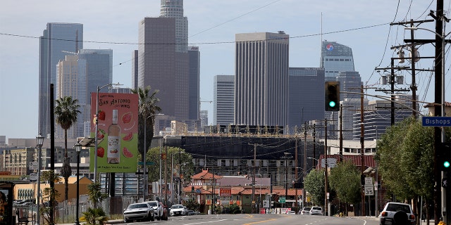 Downtown Los Angeles skyline in the background shown from the Broadway and Bishops Rd. where residents are opposed to the proposed Doger Stadium gondola that will run past their homes along Bishops Rd. in the Solono Canyon neighborhood on Thursday, March 17, 2022 in Los Angeles, CA.