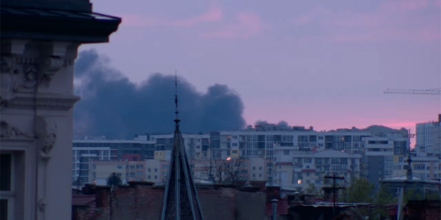 Smoke was seen in Lviv, Ukraine, after the mayor said explosions and power outages hit the city, Tuesday, May 3, 2022.