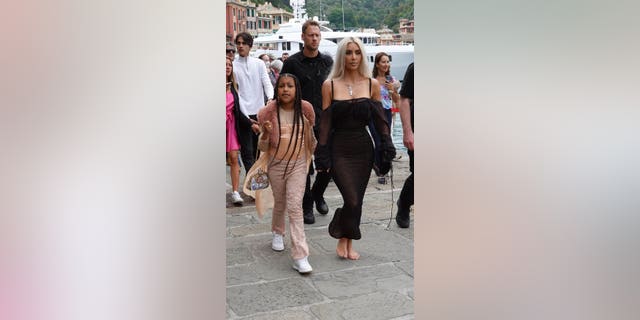 Kim Kardashian and North West were seen boarding a yacht in Portofino Italy on Saturday.