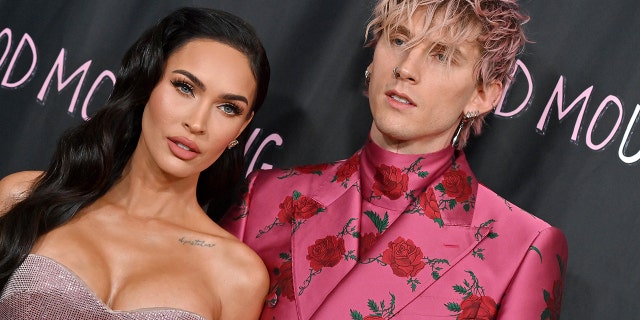 Machine Gun Kelly said Megan Fox told him it was "time to grow up" before he embarked on his directorial journey with "Good Mourning."