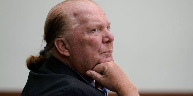 Celebrity chef Mario Batali listens on the first day of his trial, Monday, May 9, 2022, in Boston Municipal Court.