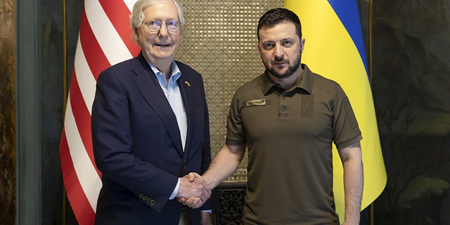 Ukrainian President Volodymyr Zelenskyy and Senate Minority Leader Mitch McConnell, R-Ky., pose for a photo in Kyiv, Ukraine, on Saturday, May 14.