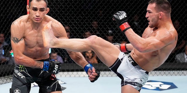 Michael Chandler knocks out Tony Ferguson in a lightweight fight during the UFC 274 event at Footprint Center on May 7, 2022, in Phoenix, Arizona.