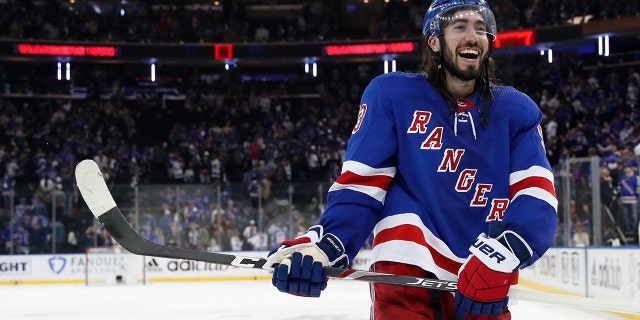 Mika Zibanejad of the New York Rangers smiles after a 4-3 overtime win against the Pittsburgh Penguins in the Stanley Cup playoffs at Madison Square Garden on May 15, 2022, in New York City.
