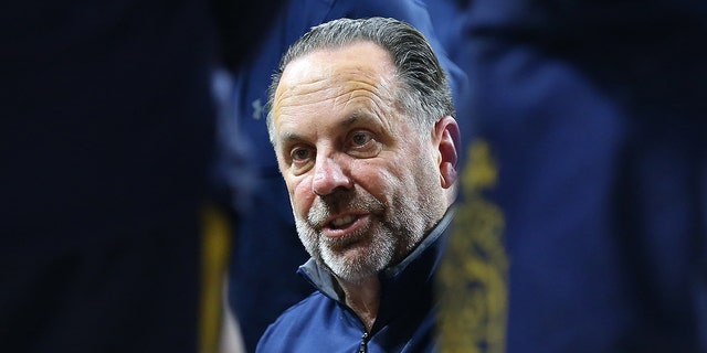 Notre Dame Fighting Irish head coach Mike Brey during a timeout during the college basketball game between Notre Dame Fighting Irish and Boston College Eagles on December 3, 2021, at Conte Forum in Chestnut Hill, MA.