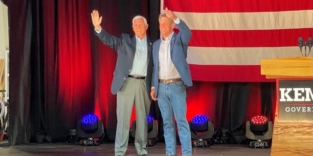 Former Vice President Mike Pence teams up with Republican Gov. Brian Kemp at a rally on the eve of the state's primary, on May 23, 2022, in Cobb County, Georgia.