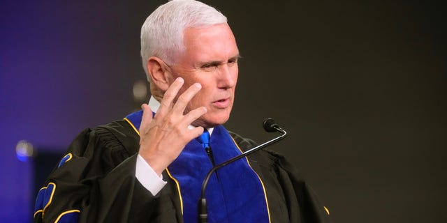 Former Vice President Mike Pence speaks to graduates of Columbia International University during commencement exercises on Saturday, April 30, 2022, in Columbia, S.C. 