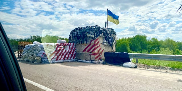 The common site of an army checkpoint on a Ukrainian road.