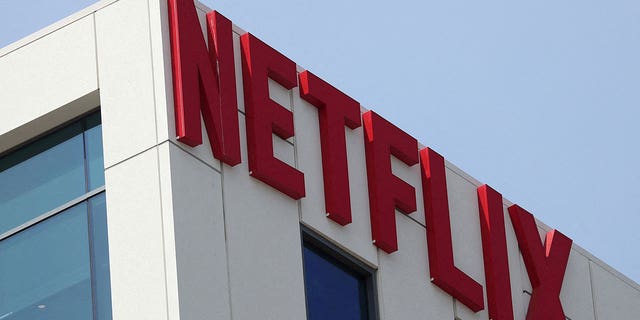 The Netflix logo is seen on the side of a building.