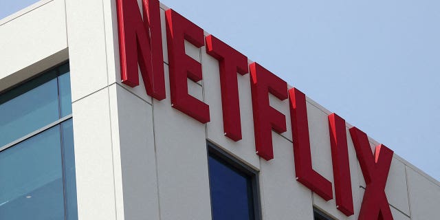 The Netflix logo is seen on the side of a building.