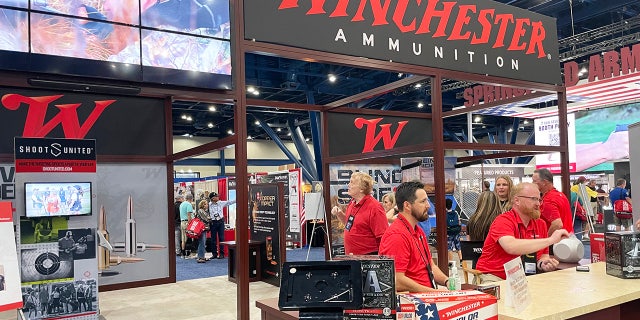 Different booths are shown on the exhibit floor of the 2022 NRA convention in Houston.