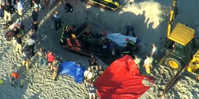 A teen digging on a New Jersey beach died Tuesday, and his younger sister was rescued after police say both out-of-towners became trapped beneath the sand when the hole collapsed on top of them. 
