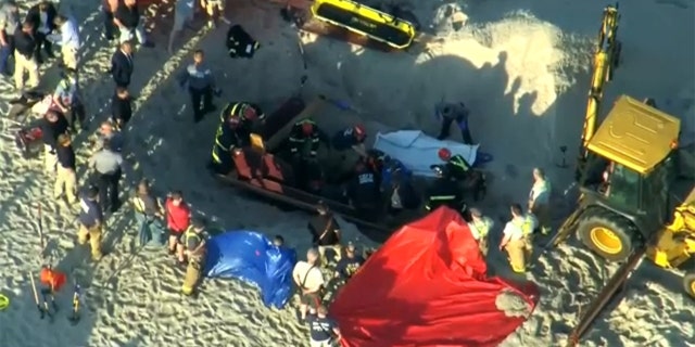 A teen digging on a New Jersey beach died Tuesday, and his younger sister was rescued after police say both out-of-towners became trapped beneath the sand when the hole collapsed on top of them.