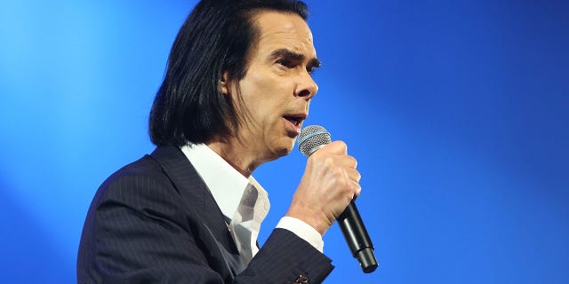 Rock icon Nick Cave said going to church and being a conservative is the modern equivalent of "f-----g" with people.