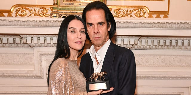 Susie Cave and Nick Cave attending the Leopard Awards in Aid of The Princes Trust and supported by the Natural Diamond Council at Goldsmith Hall on November 2, 2021 in London, England.