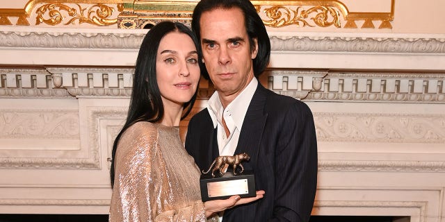 Susie Cave and Nick Cave attend the Leopard Awards in Aid of The Princes Trust and supported by the Natural Diamond Council at Goldsmith Hall on November 2, 2021 in London, England.
