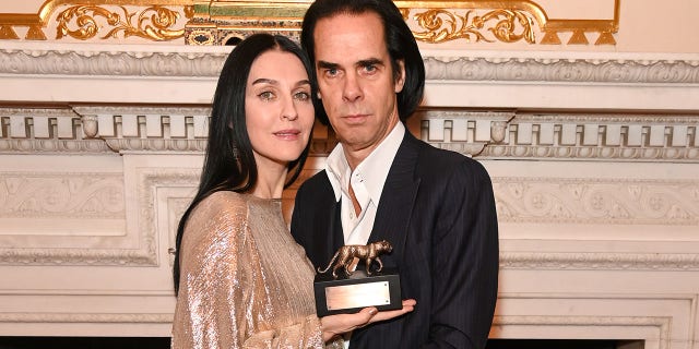 Susie Cave and Nick Cave attend the Leopard Awards in Aid of The Princes Trust and supported by the Natural Diamond Council at Goldsmith Hall on Nov. 2, 2021, in London, England.