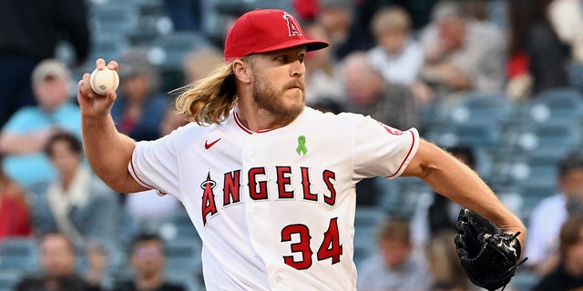 Los Angeles Angels pitcher Noah Syndergaard pitching in the first inning of a game against the Tampa Bay Rays May 9, 2022, at Angel Stadium in Anaheim, Calif.