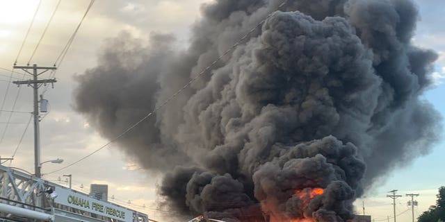 An Omaha chemical business caught fire on Monday evening sending thick black smoke and flames billowing into the air.