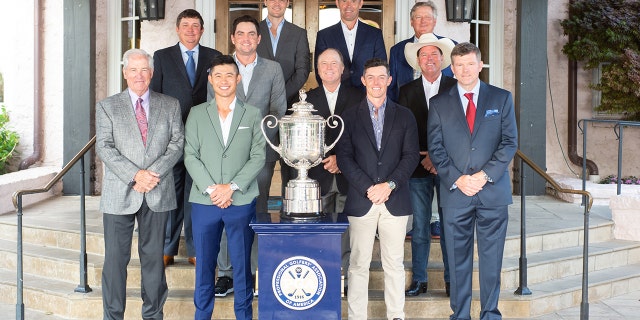 PGA officials and players pose for a photo during the champions dinner of the 2022 PGA Championship held at Southern Hills Country Club on May 17, 2022, in Tulsa, Oklahoma.