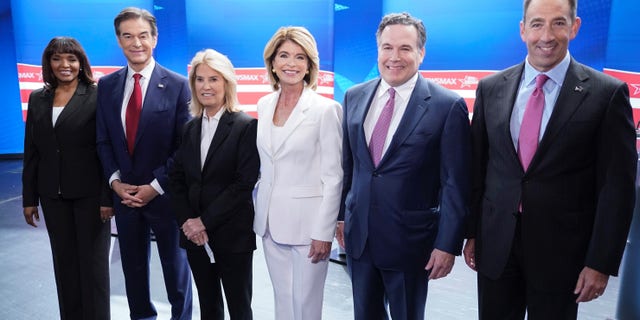 Kathy Barnette, Mehmet Oz, moderator Greta Van Susteren, Carla Sands, David McCormick, and Jeff Bartos, (left to right) before a debate in Pennsylvania