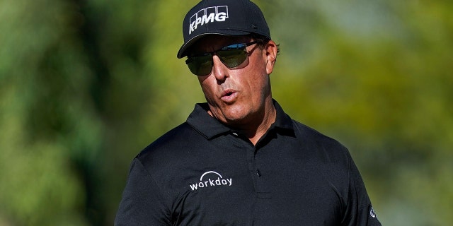 November 11, 2021; Phoenix, Arizona, USA; Phil Mickelson reacts after missing his putt just off the 18th hole during the first round of the Charles Schwab Cup Championship golf tournament in Phoenix