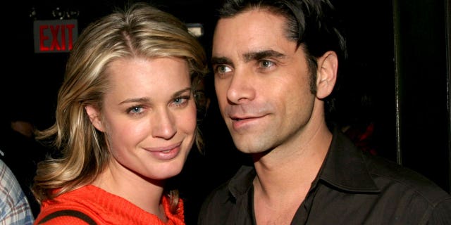 Rebecca Romijn-Stamos and John Stamos during "Dinah, The Christmas Whore by David Sedaris: A Benefit for Everybody Wins Children's Literacy Fund" at Lot 61 in New York City.
