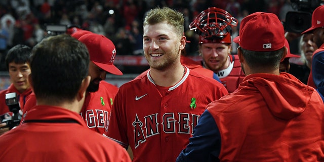 Los Angeles Angels pitcher Reid Detmers on the field after throwing a no-hitter to defeat the Tampa Bay Rays 12-0 May 10, 2022, at Angel Stadium in Anaheim, Calif.